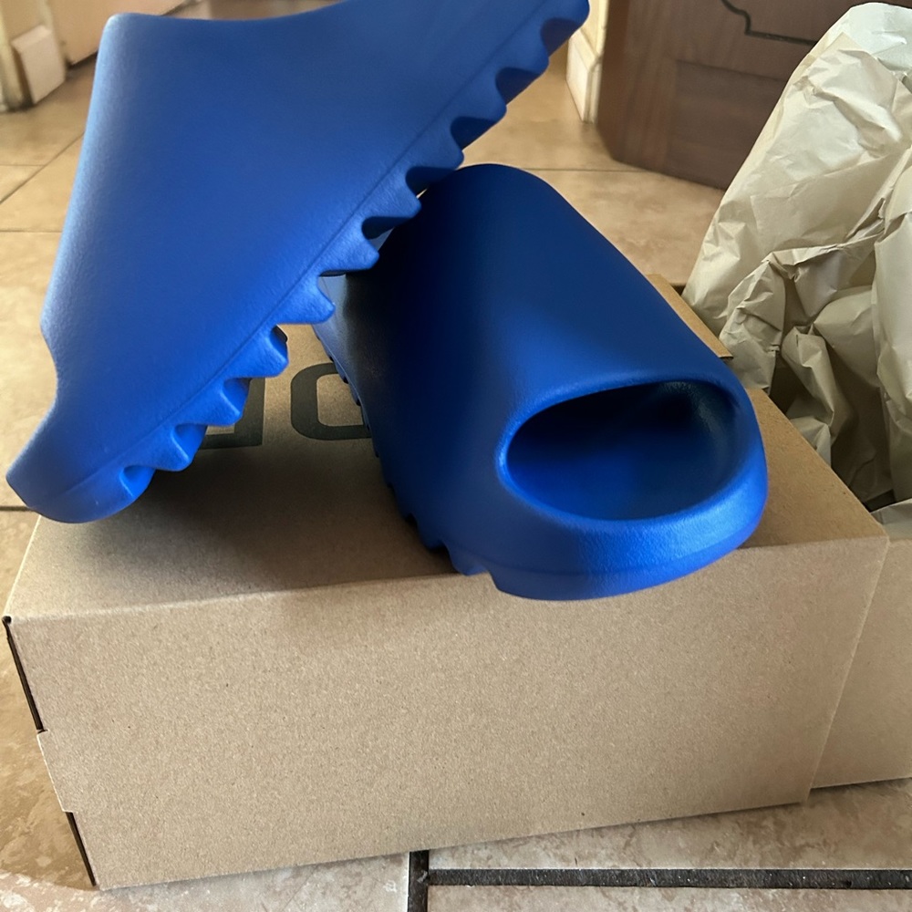 Blue Yeezy slides
